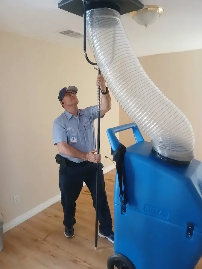 Mini Split Installation technician using HEPA equipment in Mukwonago